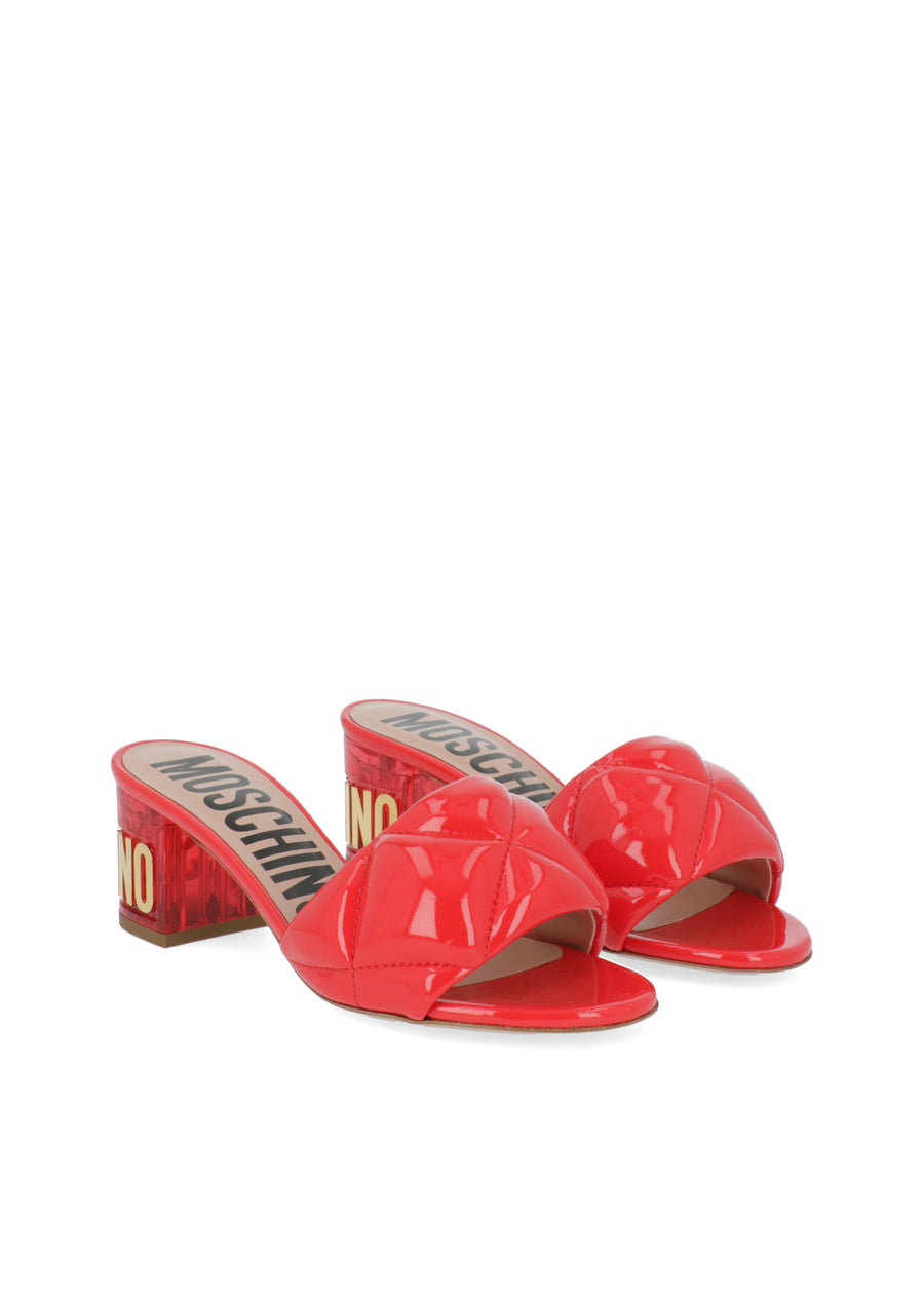Moschino Mules con logo MSC-MA28615